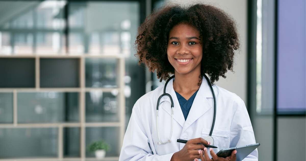 young female radiologist holding clipboard 